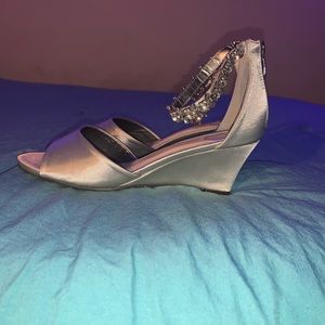 Beautiful silver shoes with sparkly ankle strap. Size 7